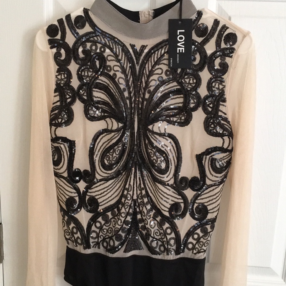 LOVE University bodysuit! WOW! Grab a black ballroom skirt or tuxedo pants!